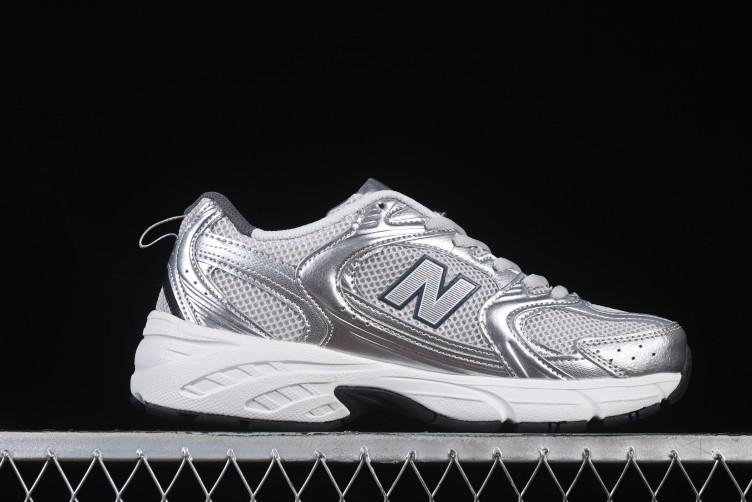 NB 530 "Grey Matter Silver Metallic"